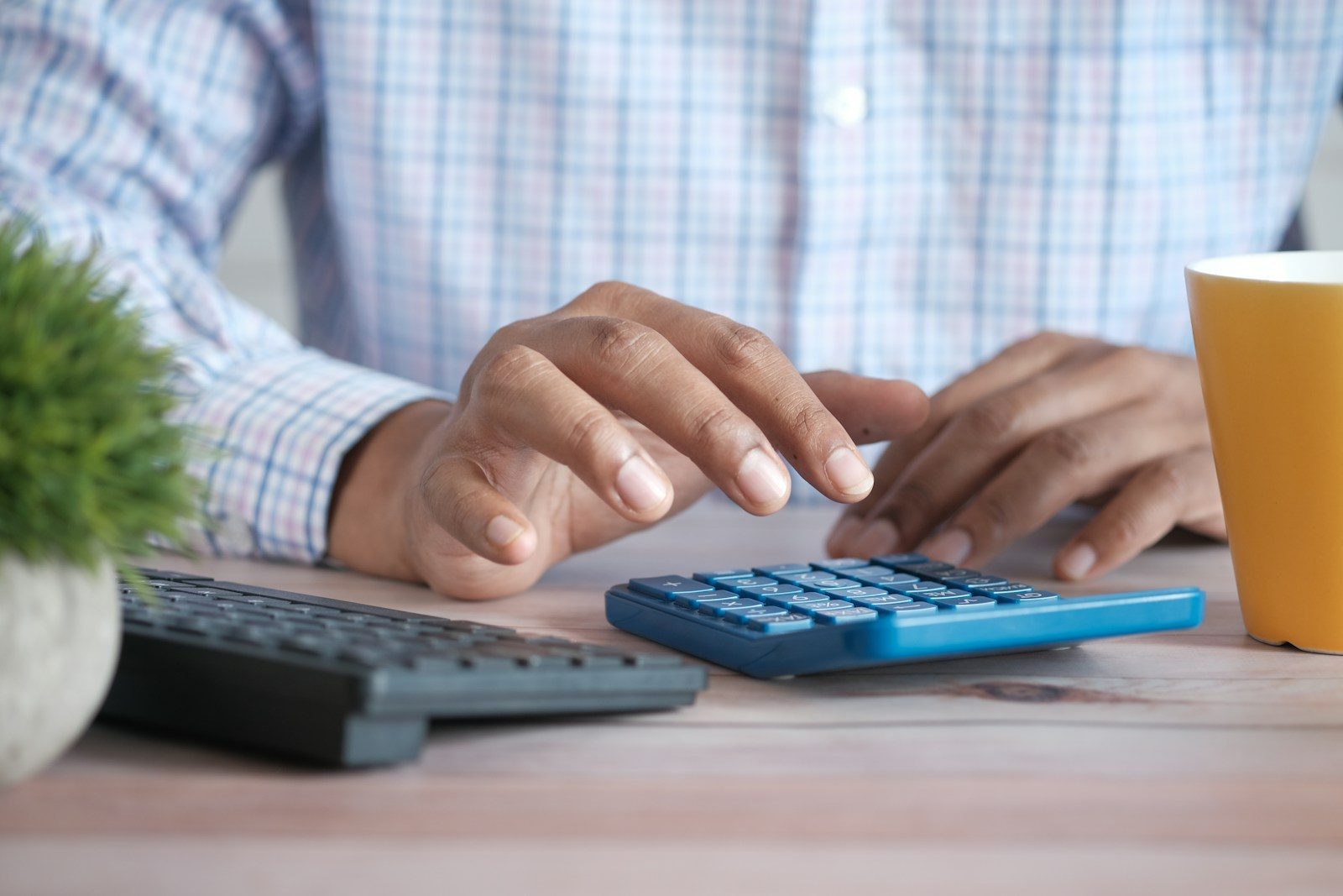 Calculator and tax documents — Greek rental income tax 2026