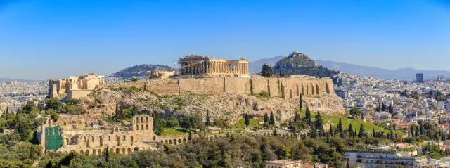 The Athens skyline with the Acropolis, the market where short-let and long-let compete.